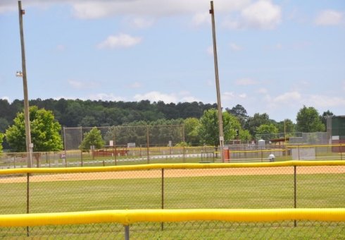 view of softball field and fence